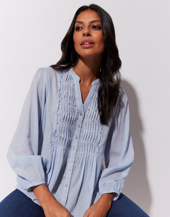 Blouse bleu ciel femme sale