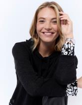 Top manches longues uni décoré