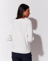 Pull fin uni décoré