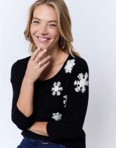 Pull fin uni décoré