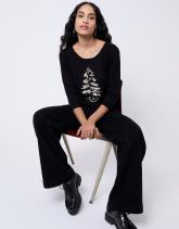 Pull fin uni décoré